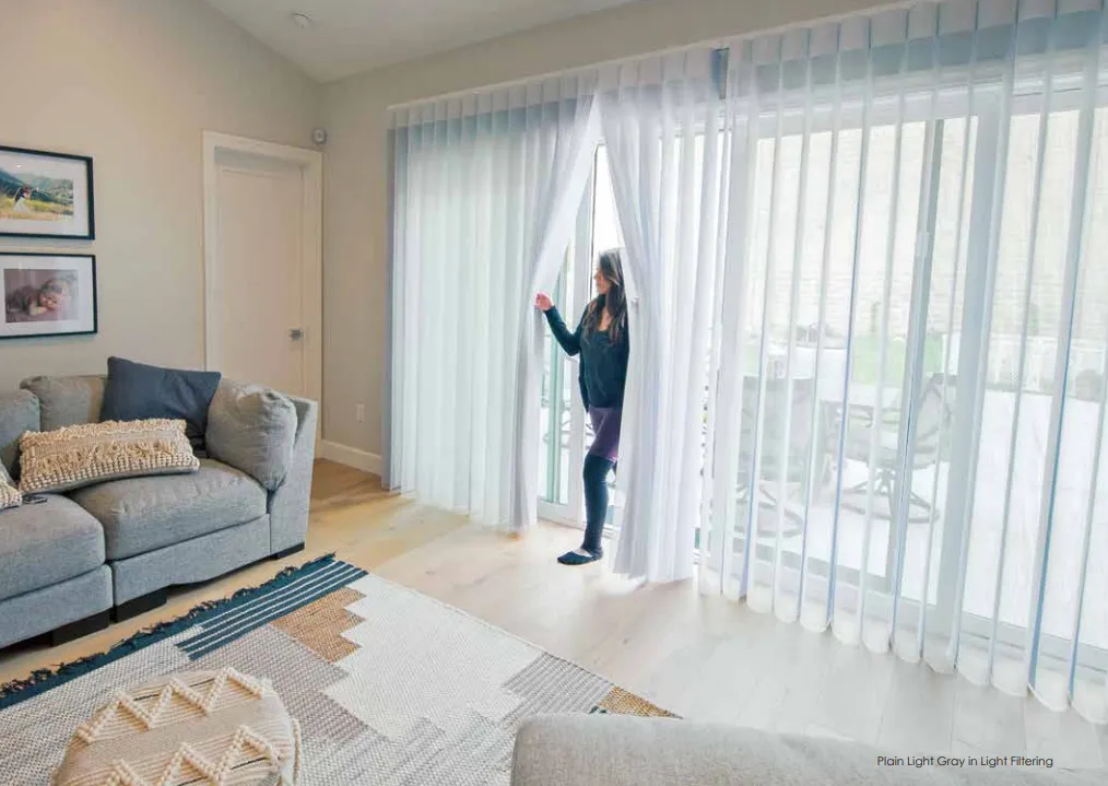 Walking straight through SmartDrape vanes at a living room sliding door